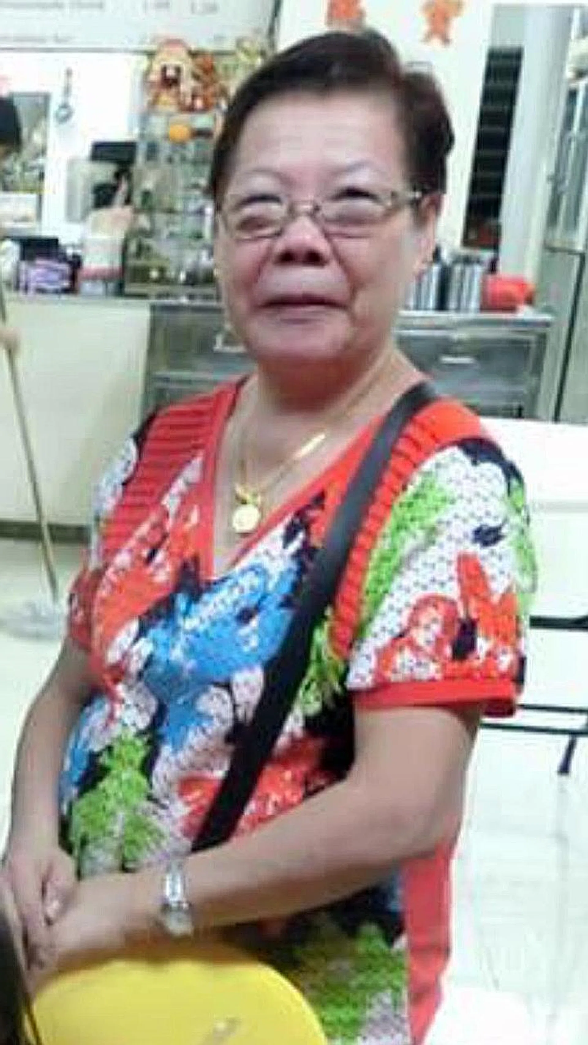 (Above) Madam Ong Bee Eng.