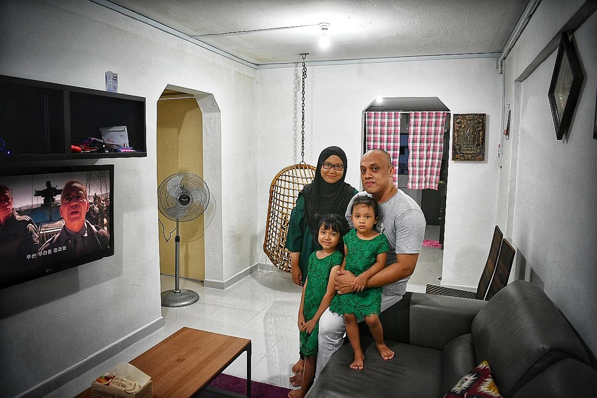 Mr Mohammad Suhaimi Junaini, Ms Mariamah Tukiran, and their children Dhiya Marissa and Zia Syadza. 