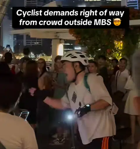 Cyclist's demand for right of way in crowded MBS draws netizens' ire