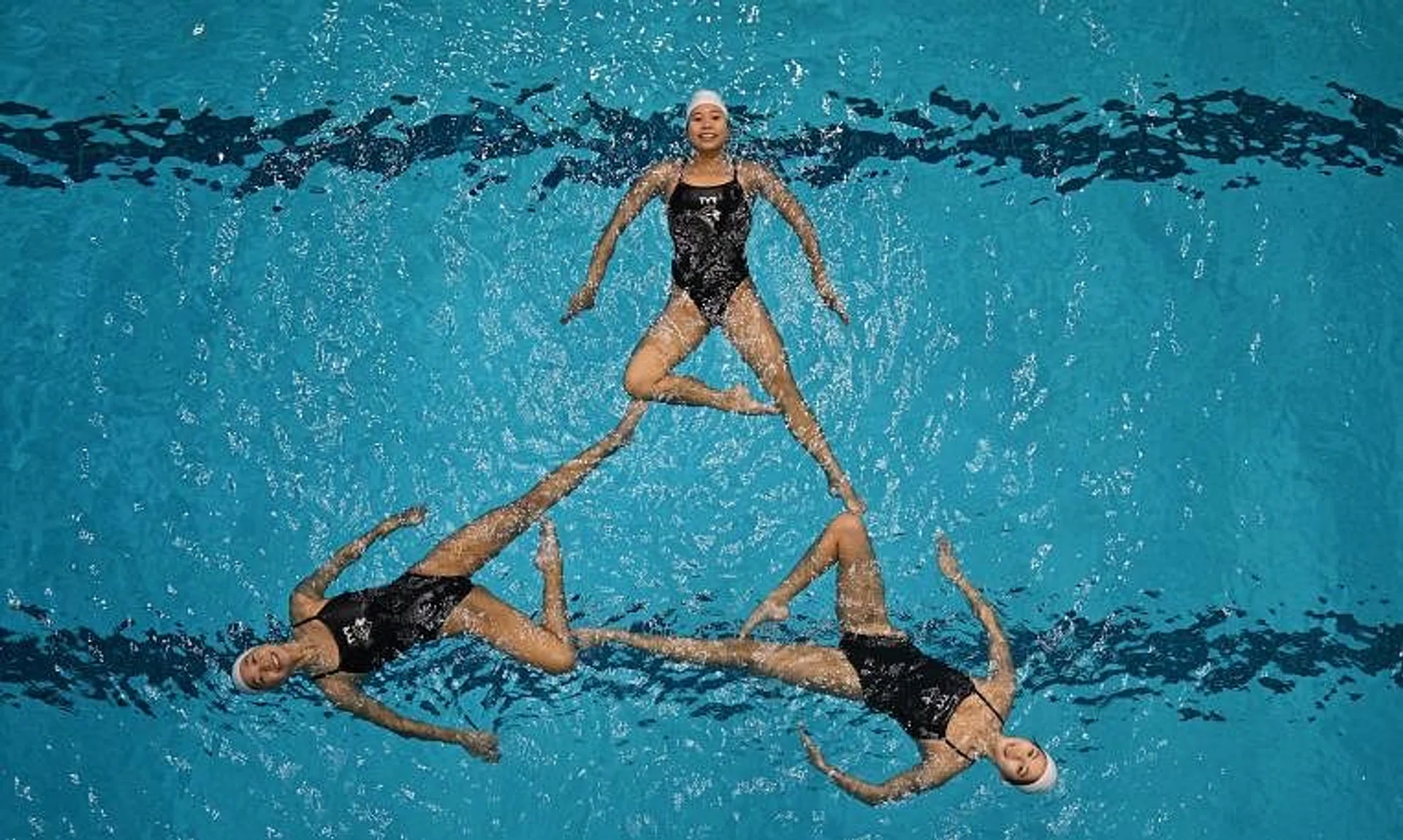 Artistic swimmers Kiera Lee (from left), Vivien Tai and Claire Tan are hoping to win a medal at the Hangzhou Asian Games.