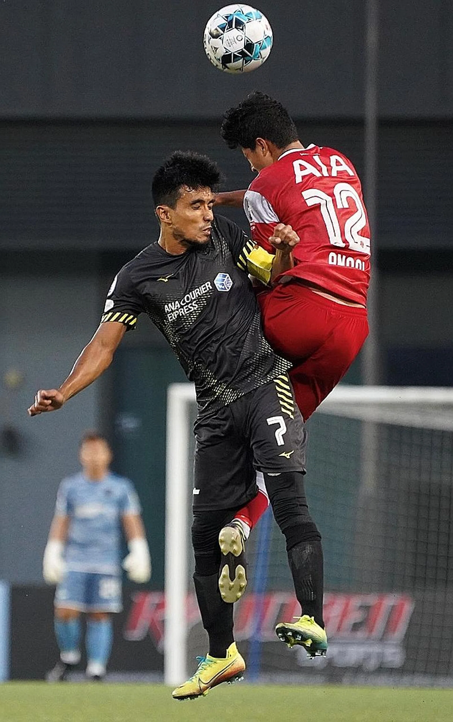 Tampines Rovers' Yasir Hanapi challenging Tanjong Pagar United's Anaqi Ismit. 