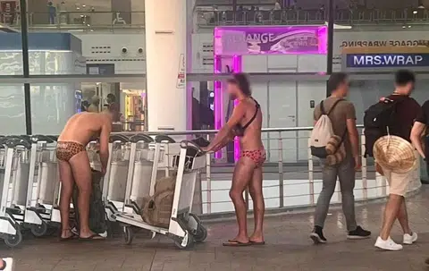 Tourists spotted wearing only trunks and slippers at Phuket airport
