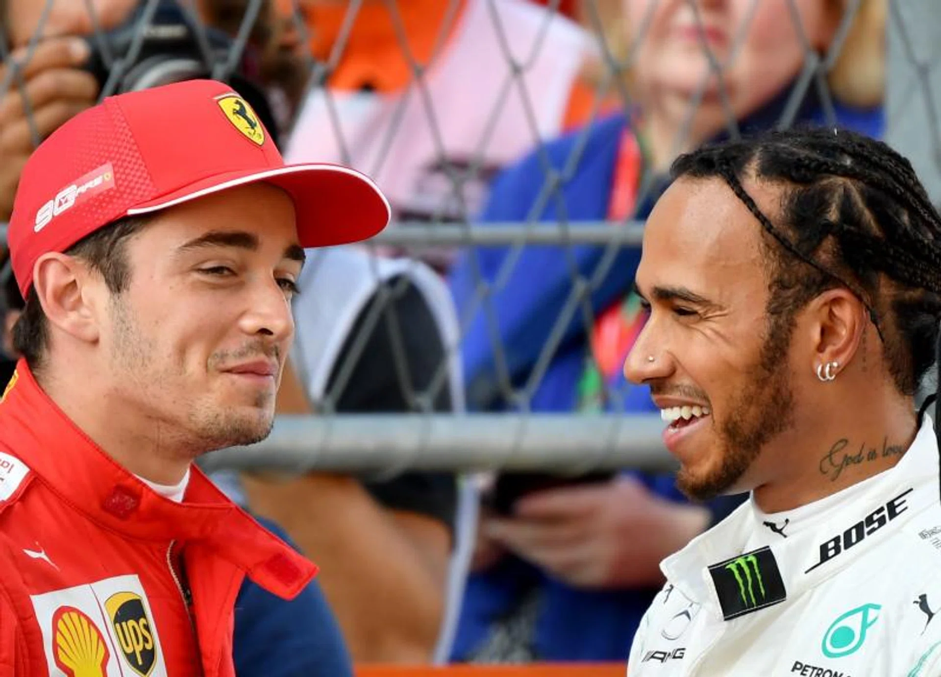 Lewis Hamilton (right) admits that he remains amazed by Ferrari's power and speed on the straights as Charles Leclerc (left) secured his fourth pole in a row.