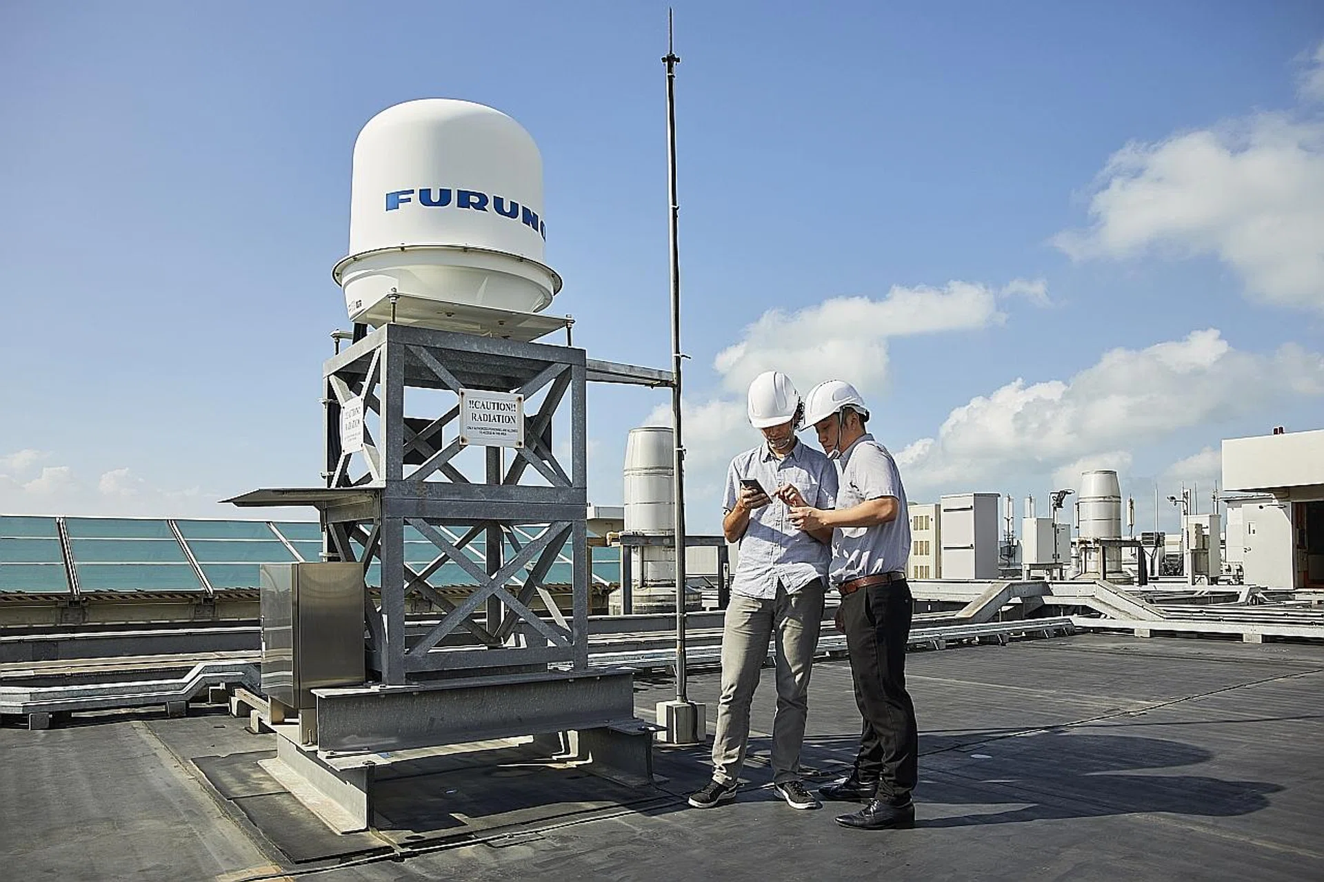 Left: The X-band radar at Changi Water Reclamation Plant. PUB's two other X-band radars are located at the CleanTech One building in Jurong and Woodlands NEWater Service Reservoir.