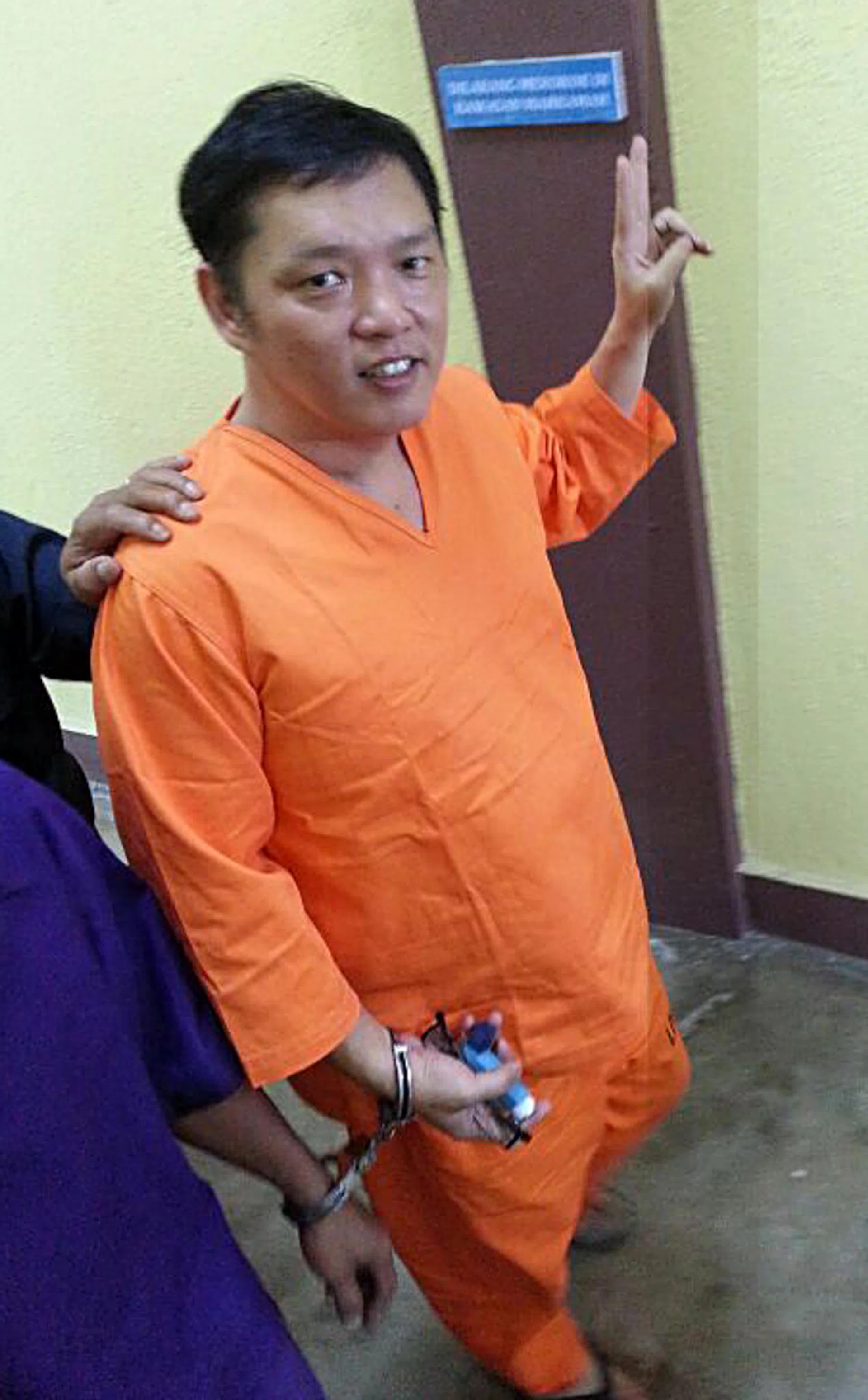 TO THE GALLOWS: Quah Tee Keon was yesterday sentenced to death for murdering his wife's alleged lover in their house in Pahang. 
