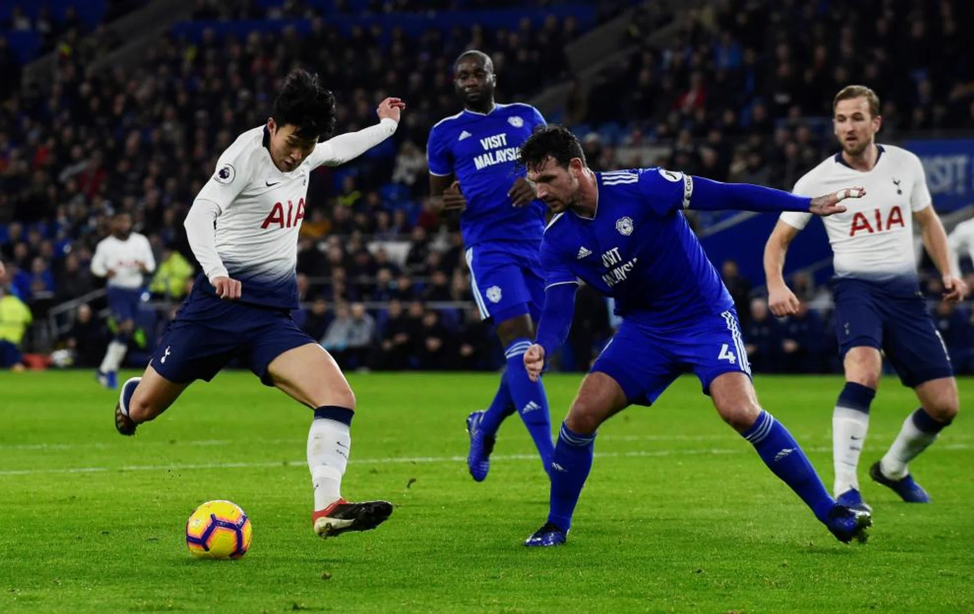 Son Heung Min (far left) scoring Tottenham's third goal against Cardiff City.