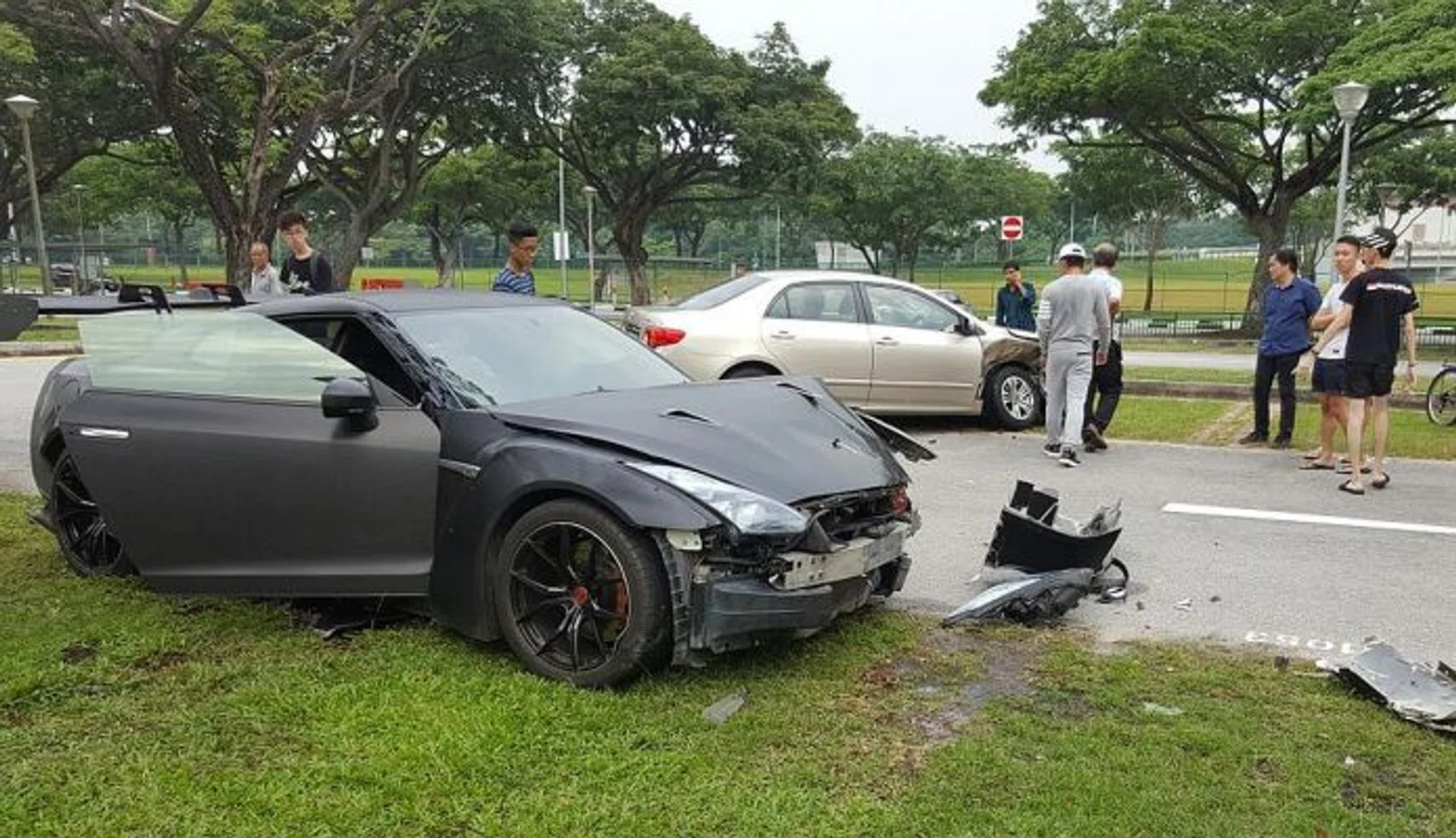 DAMAGE: A Nissan GT-R slammed into a Toyota Altis at Leisure Park Kallang carpark on Saturday.