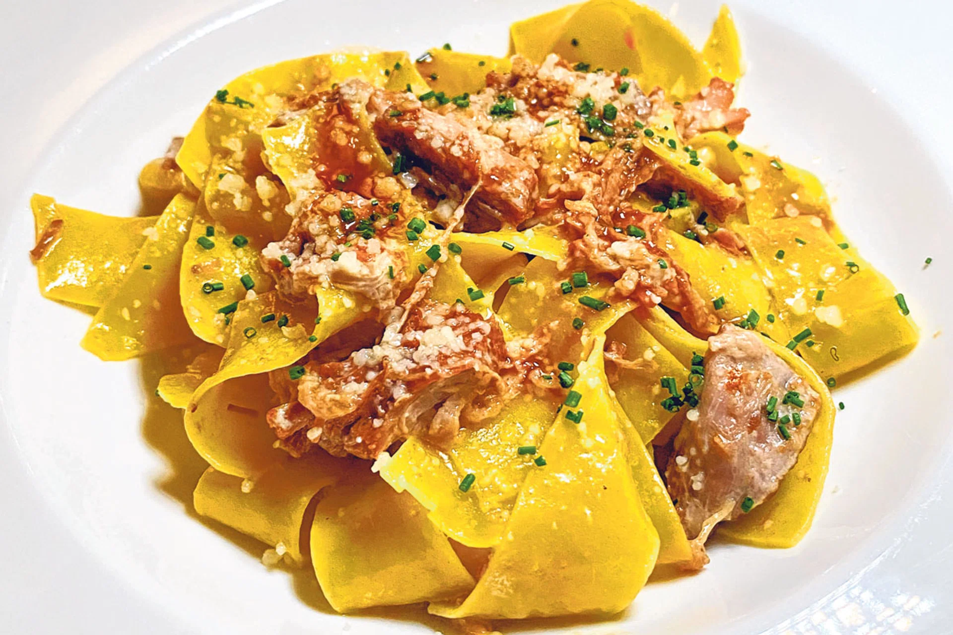 Dishes that impressed : Pappardelle (above), Gnocchi, Melanzana alla Parmigiana, Polipo, and the Faraona, a breast of guinea fowl cooked sous vide.   
