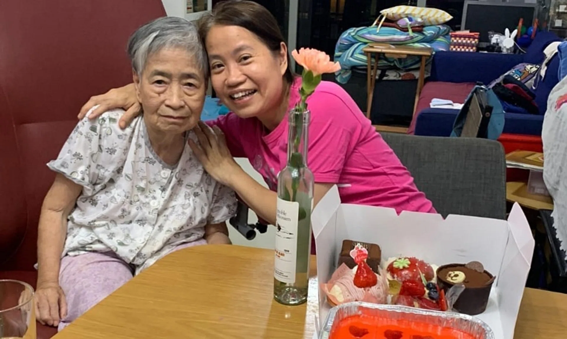 Ms Serene Low (right), seen here with with her mother Madam Chow Fong Kheng, found support for caregivers like herself through Care Corner Singapore.