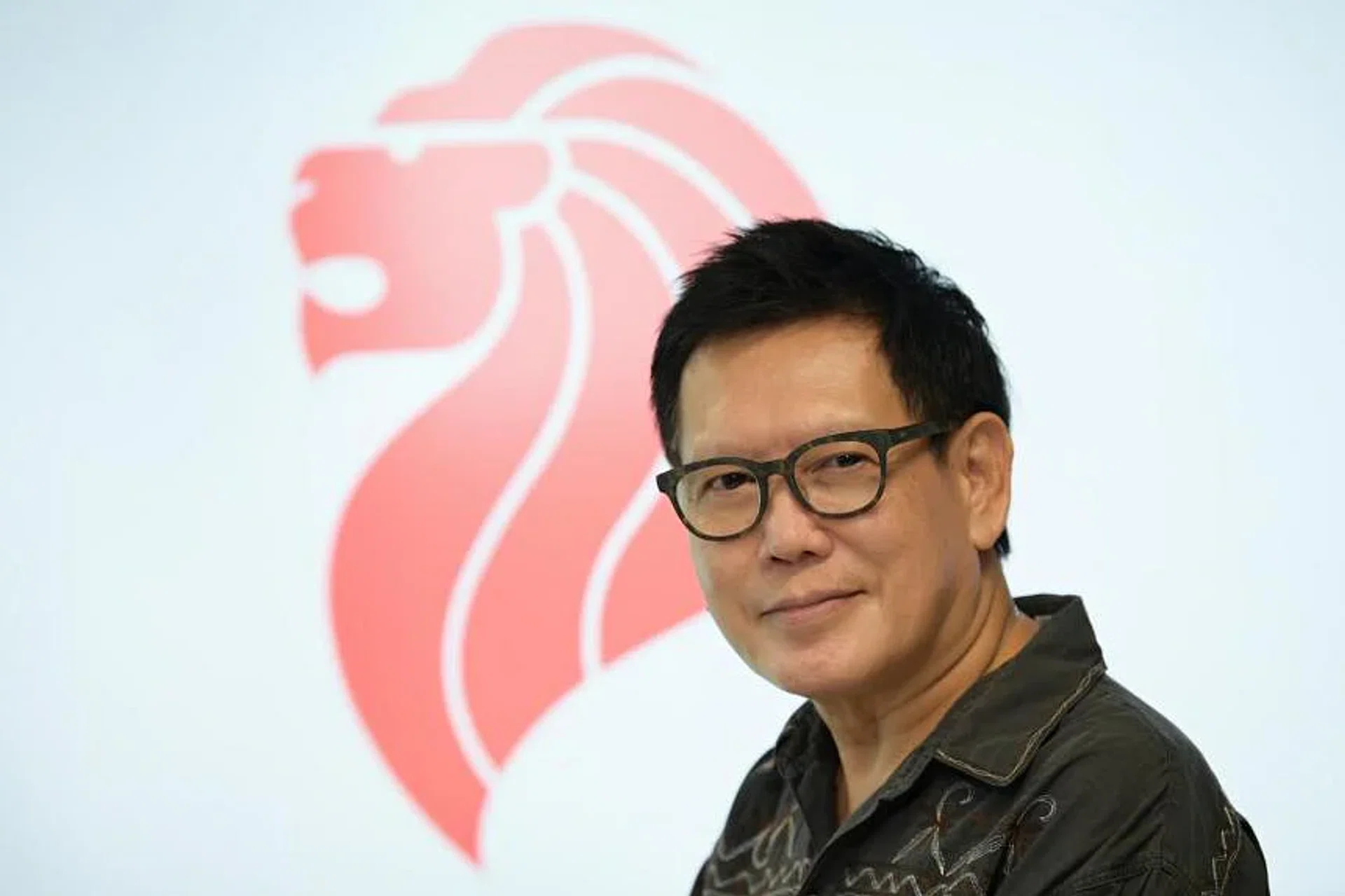 Senior advertising lead Michael Lee won the competition for a symbol to represent Singapore in 1986. 
