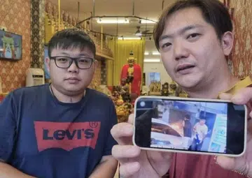 'I was worried car would explode', says man ridiculed for trying to put out fire with crowbar