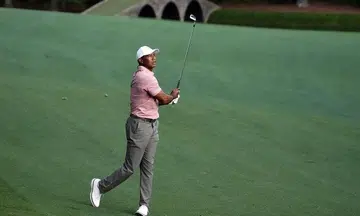 Woods clears first Masters hurdle, now faces ultimate test