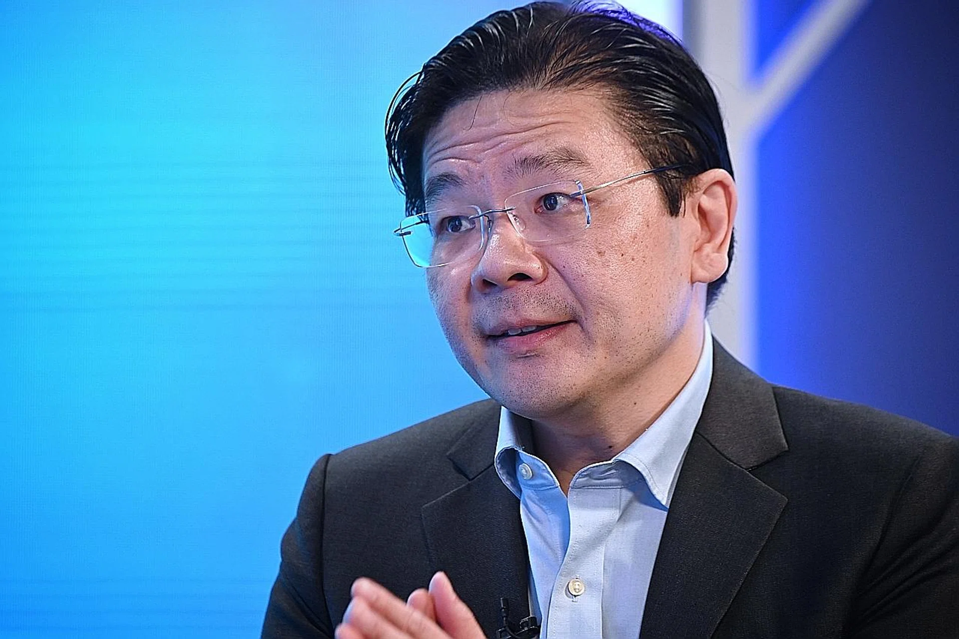 Finance Minister Lawrence Wong said no business hub can avoid global competition. 