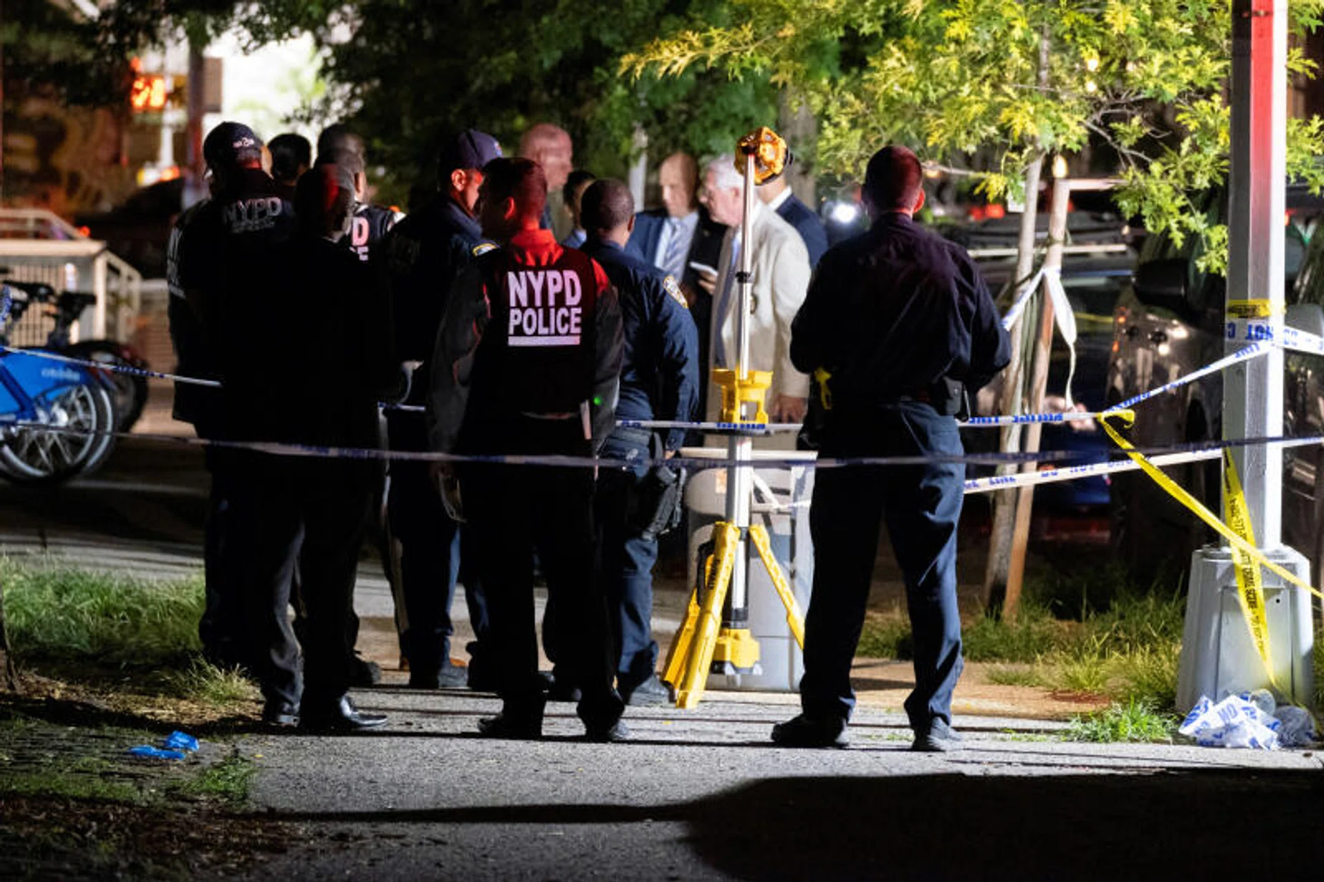 Police investigators at the scene of the fatal shooting of a 20-year-old woman on the Upper East Side of Manhattan on Wednesday night, June 29, 2022. 