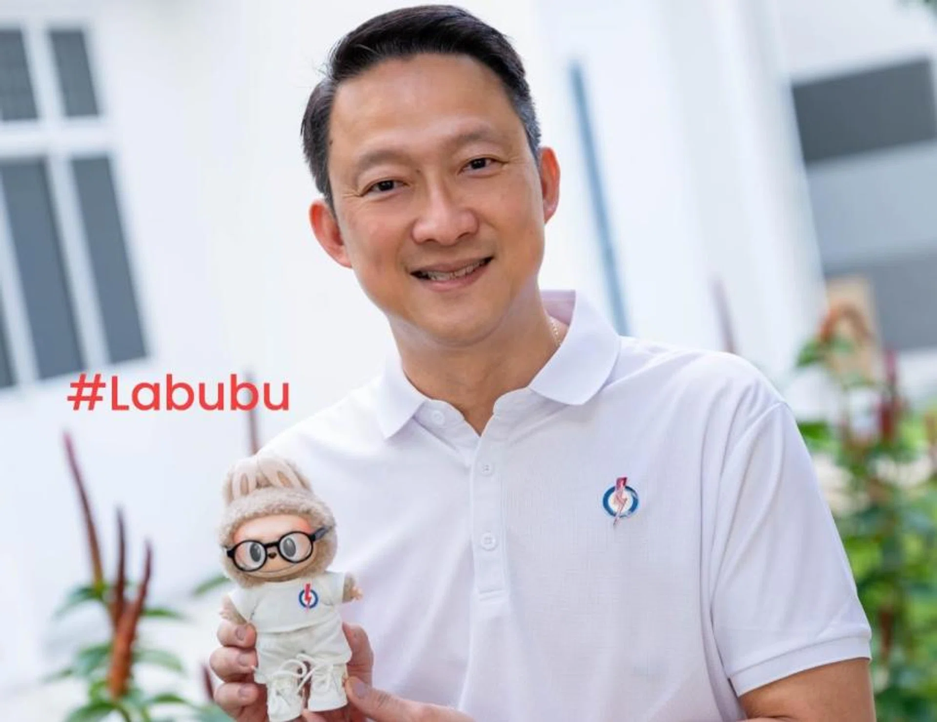 Mr Lam Pin Min, branch chairman of the PAP Sengkang West branch, proudly showed off the doll decked out in full PAP regalia – a party logo t-shirt, matching pants, sneakers, and even a pair of trendy black-framed glasses.