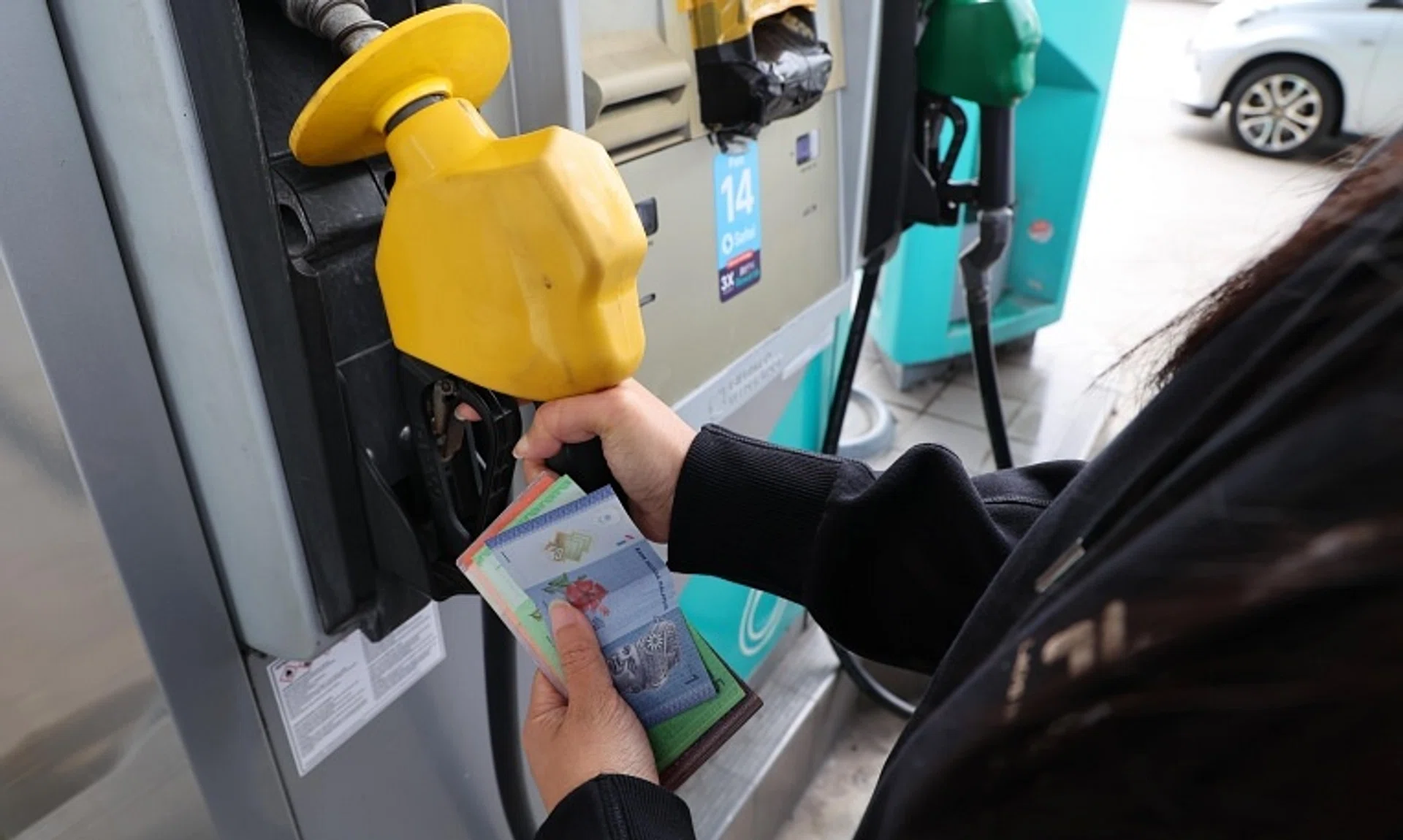 Only Malaysian-registered cars are permitted to purchase RON95 petrol, which costs RM2.05  (65 Singapore cents) a litre.