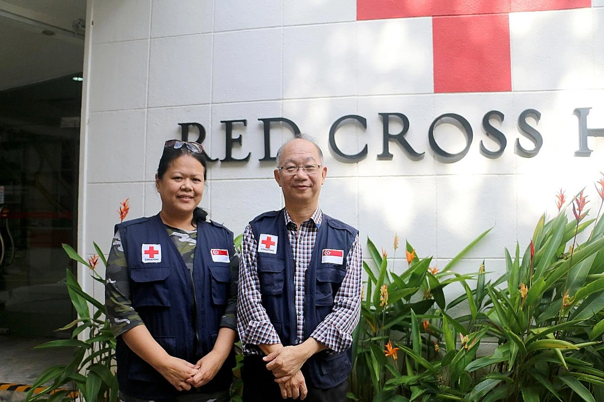 Miss Pat Jeanisa Ng and Mr David Yeo are still Red Cross volunteers. 