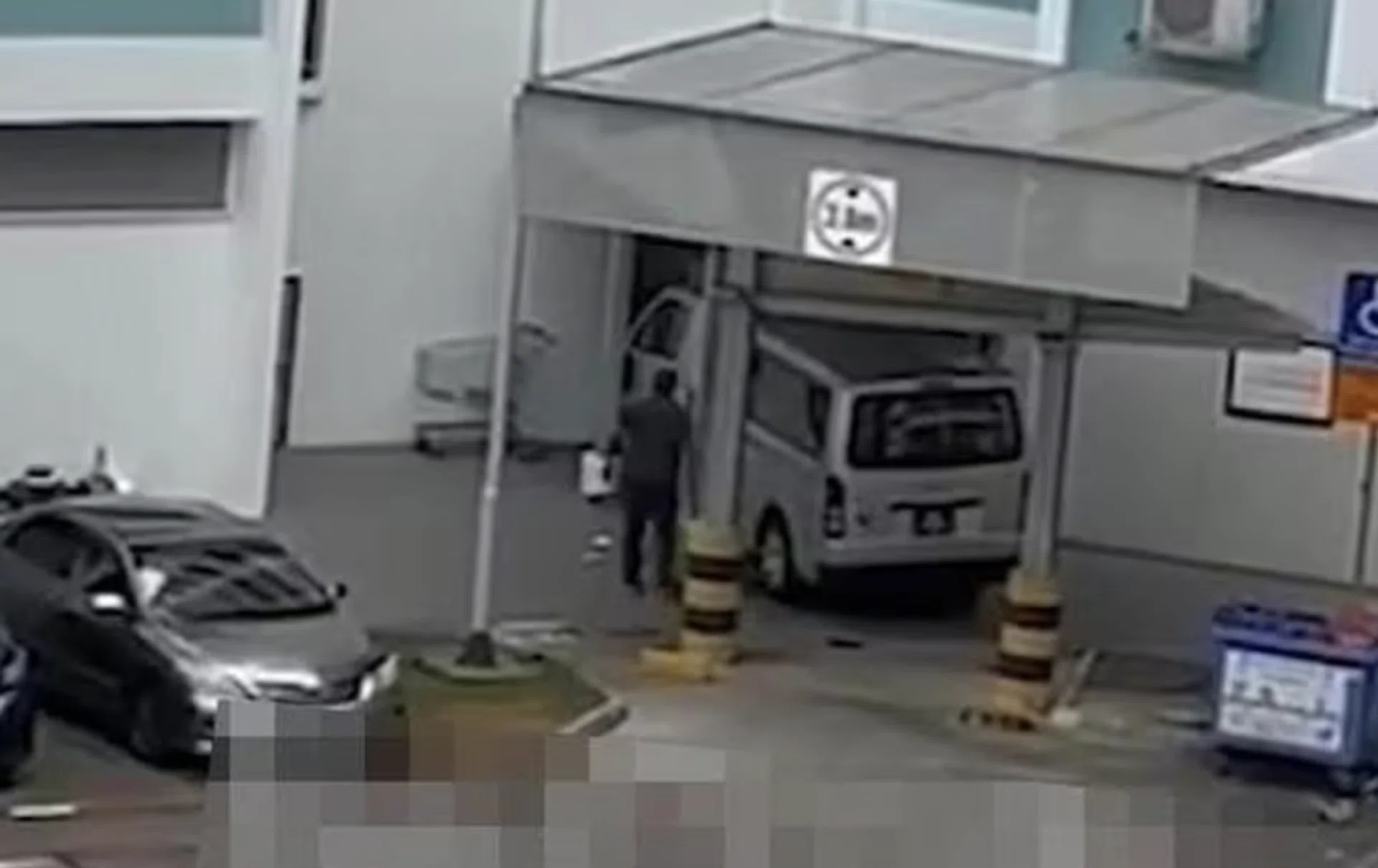 Screenshot from the video showing the trapped van.