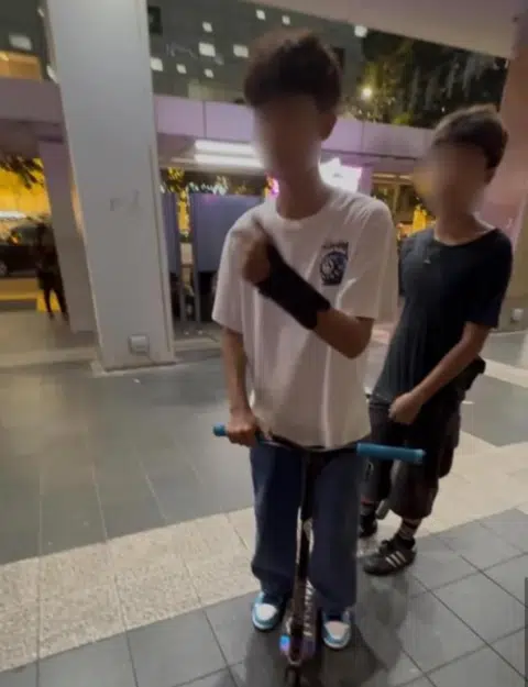 Teens 'fall' and allegedly try to scam woman into compensating