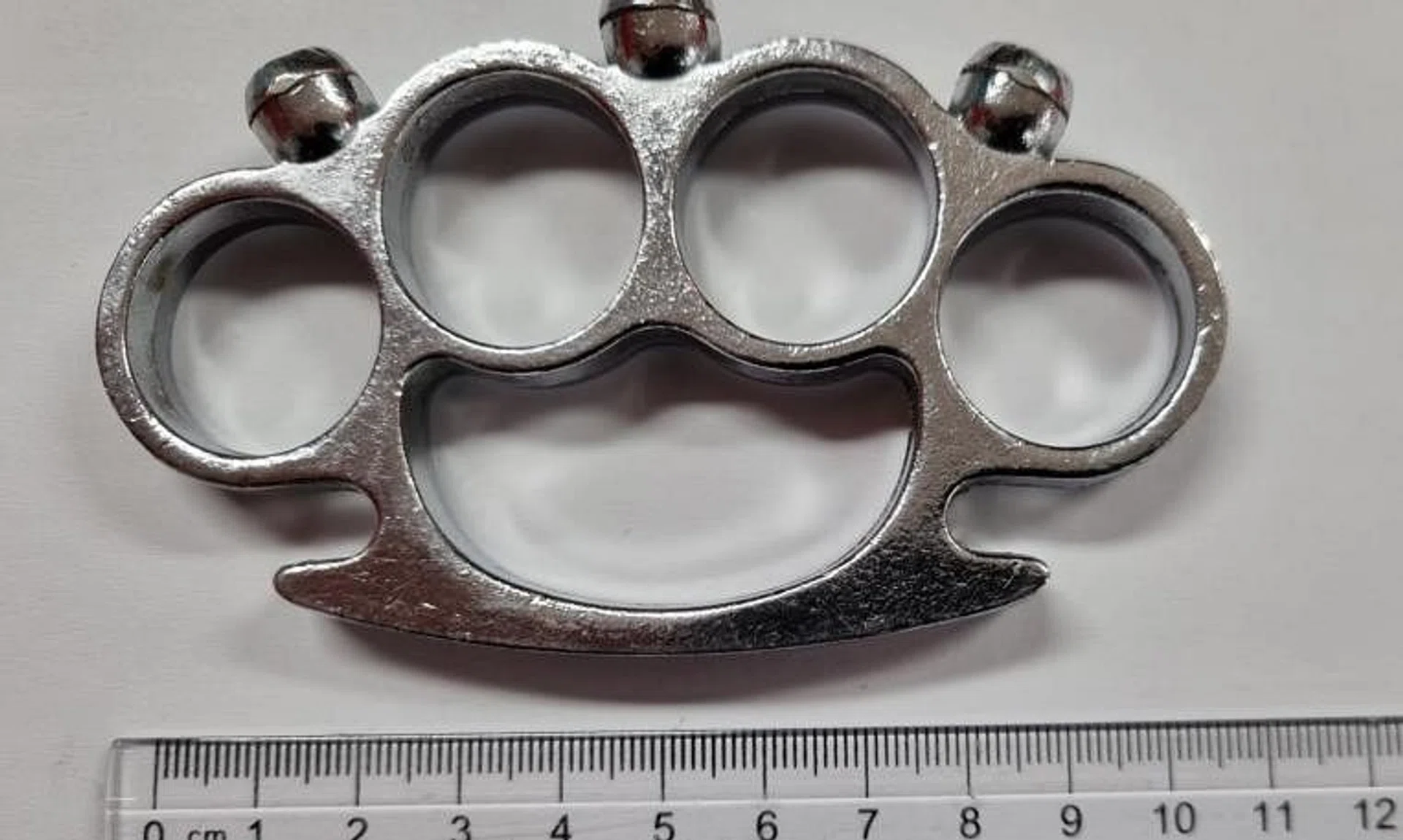 A knuckle-duster was found concealed in the man's underwear.