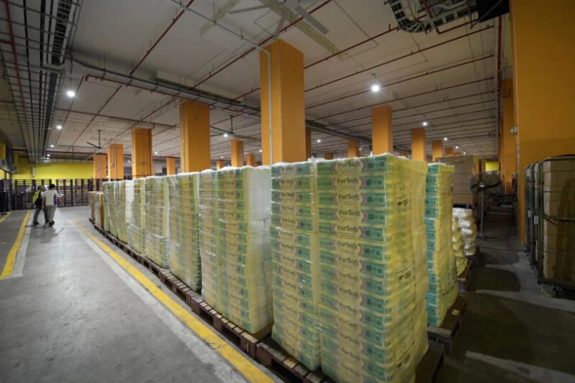 Stacks of toilet paper are seen in the FairPrice Benoi Distribution Centre on March 7, 2020.
