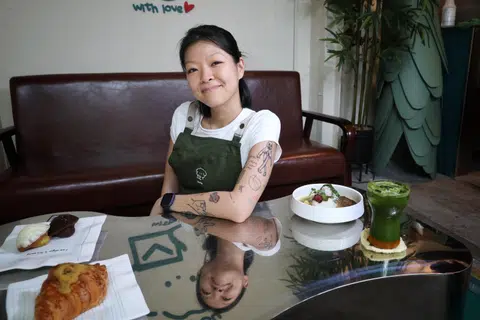To:You co-owner Laura Lau, 28, welcomes diners to sit as long as they wish at the cafe.