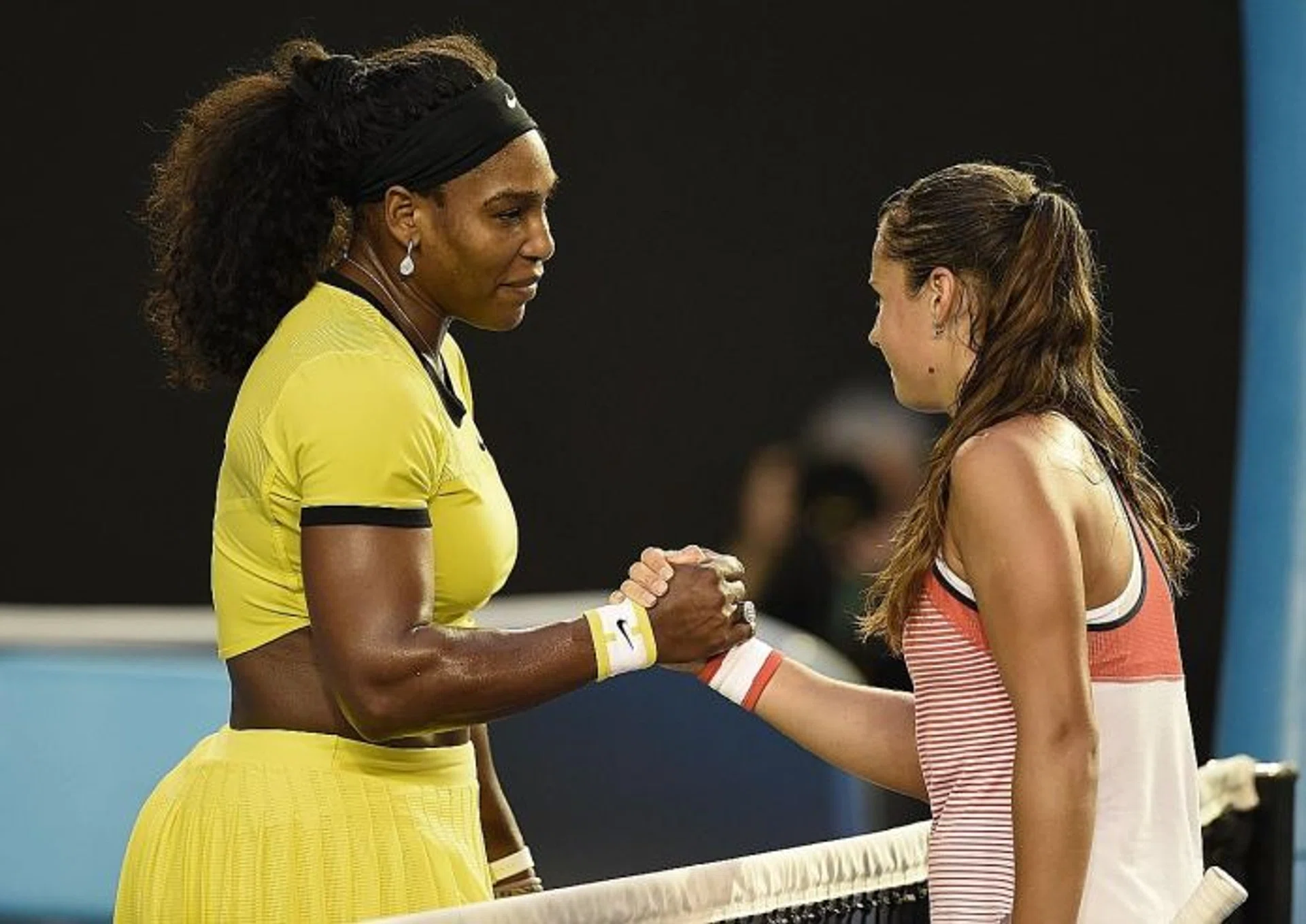 WORDS OF ENCOURAGEMENT: Serena Williams consoles a stunned Daria Kasatkina, saying that the young Russian has a bright future ahead of her.