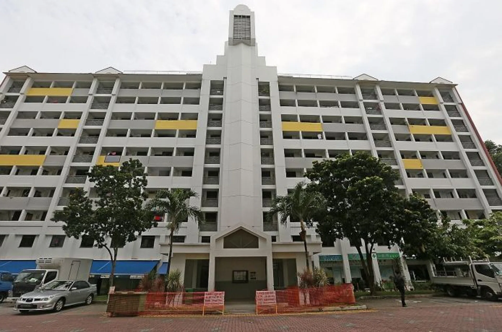 CRASH!  (Above) The top part of the HDB block which is missing part of its facade. 