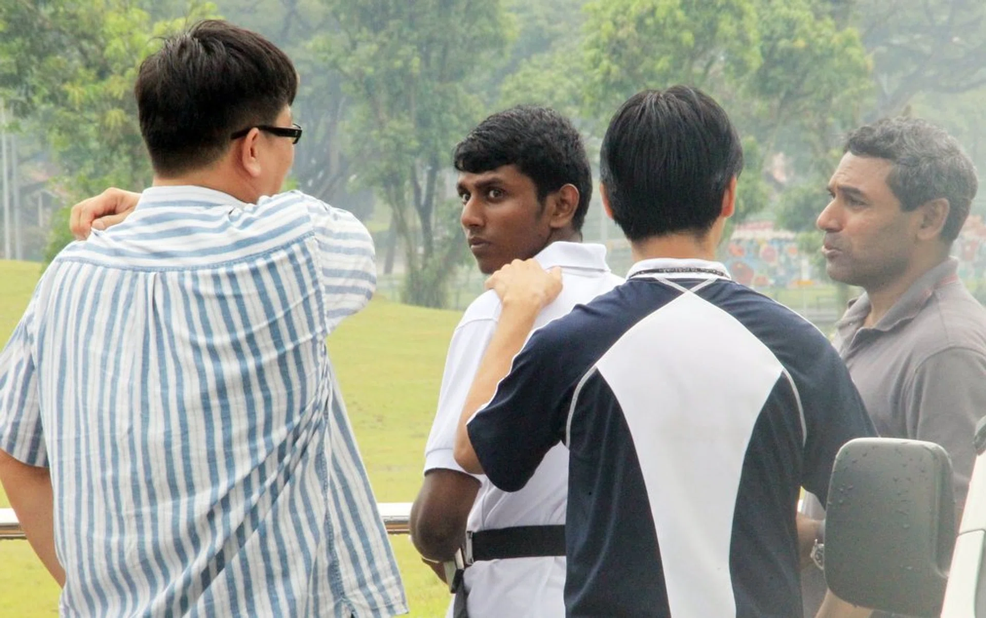 Sumanthiran Selvarajoo (centre) was jailed 16 years and sentenced to receive 12 strokes of the cane after he attacked and killed an elderly man with an umbrella at Ang Mo Kio park in 2011.