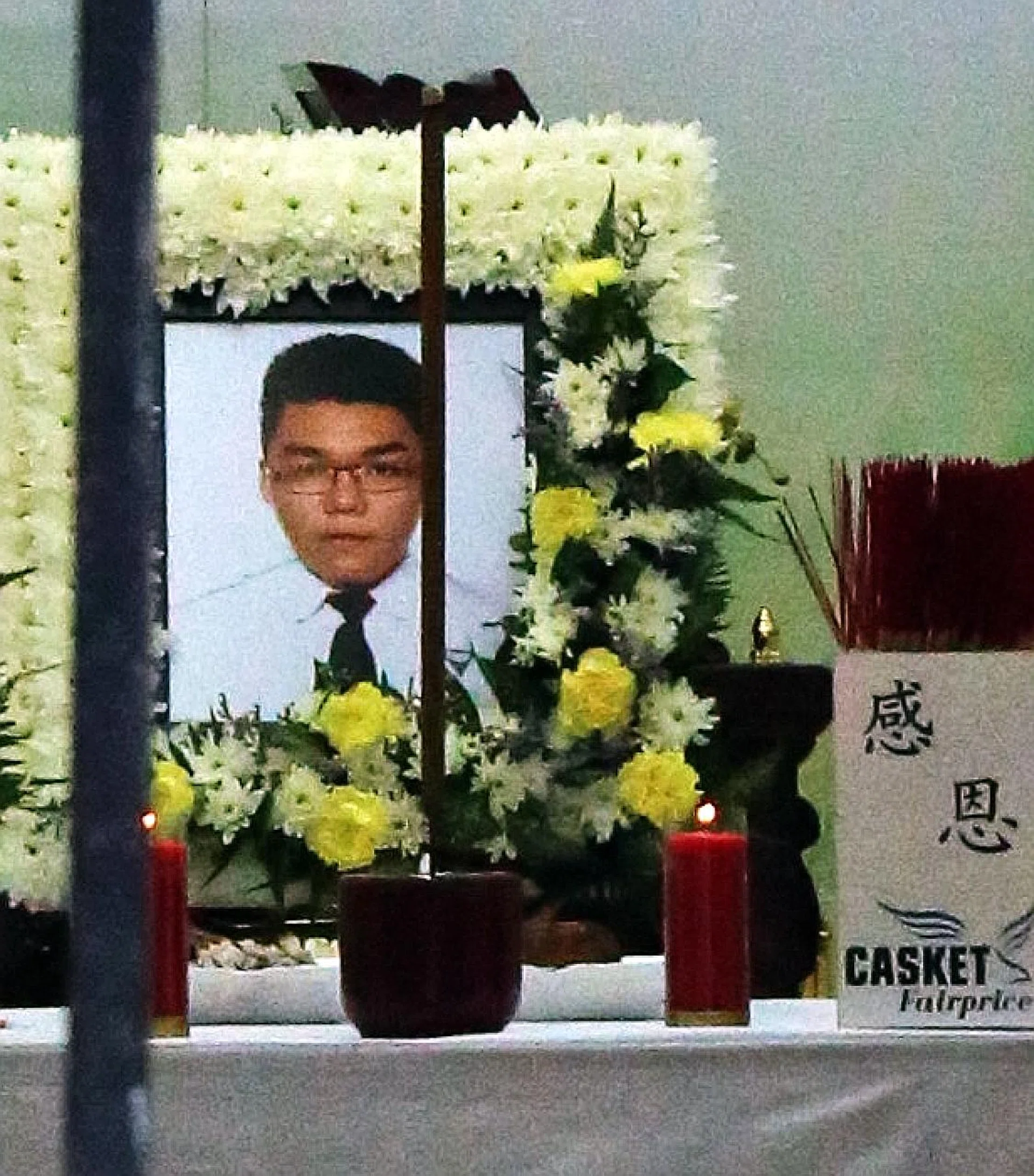 Tan Yao Bin, 15, died after he was electrocuted while showering. 