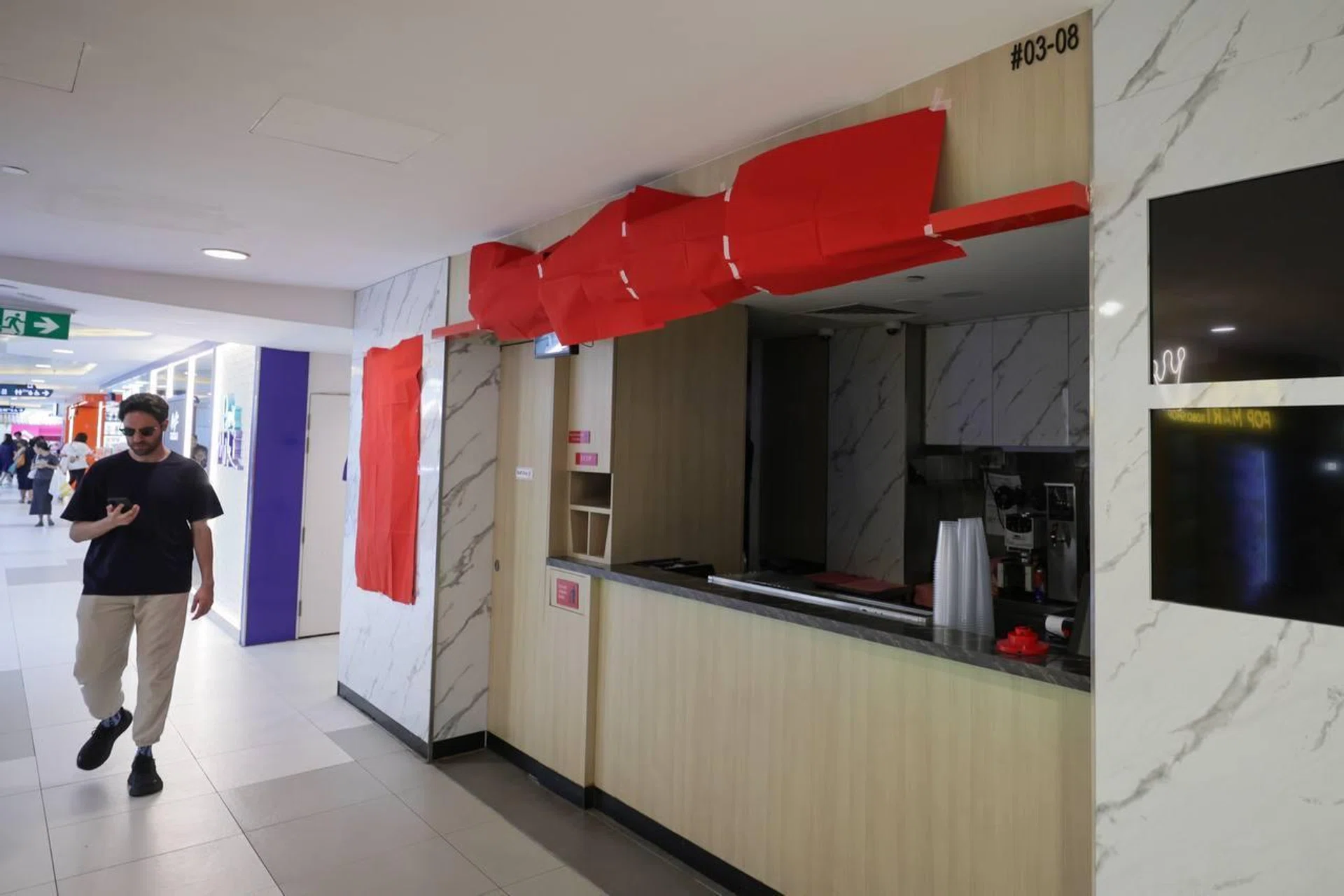 The Gong Cha outlet at Bugis Junction was shut when ST visited on Oct 2, with its signage covered with red paper.