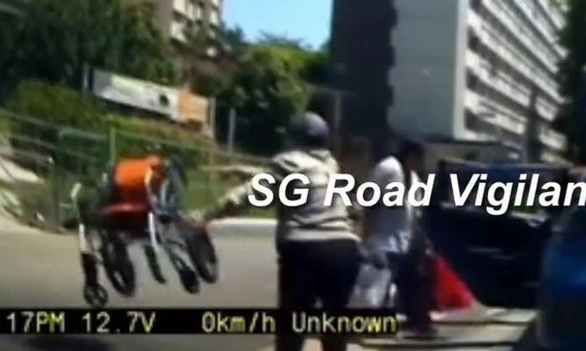 The taxi driver was caught on camera tossing her passengers' wheelchair to the ground.