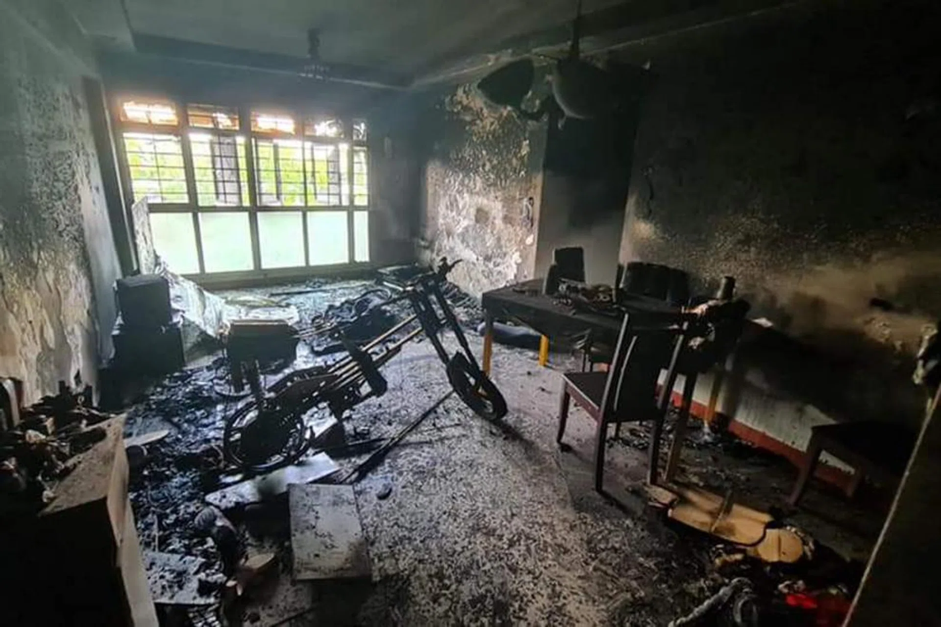 The aftermath of the fire at the sixth-storey unit in Block 466C, Sembawang Drive. 
