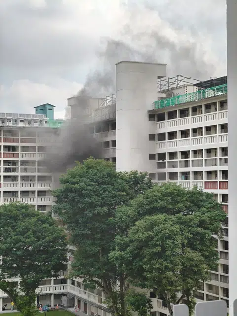 In photos of the incident shared with The Straits Times, plumes of black smoke can be seen billowing from the building.