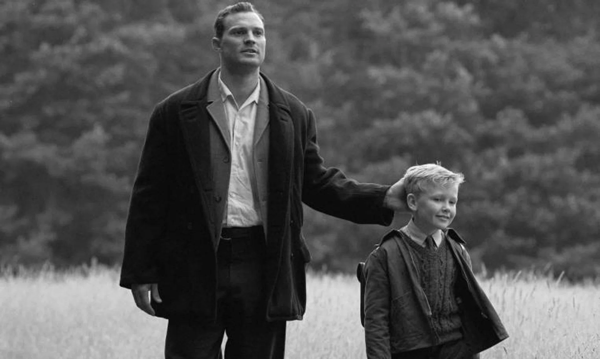 Still from the film Belfast starring Jamie Dornan (left) and Jude Hill.