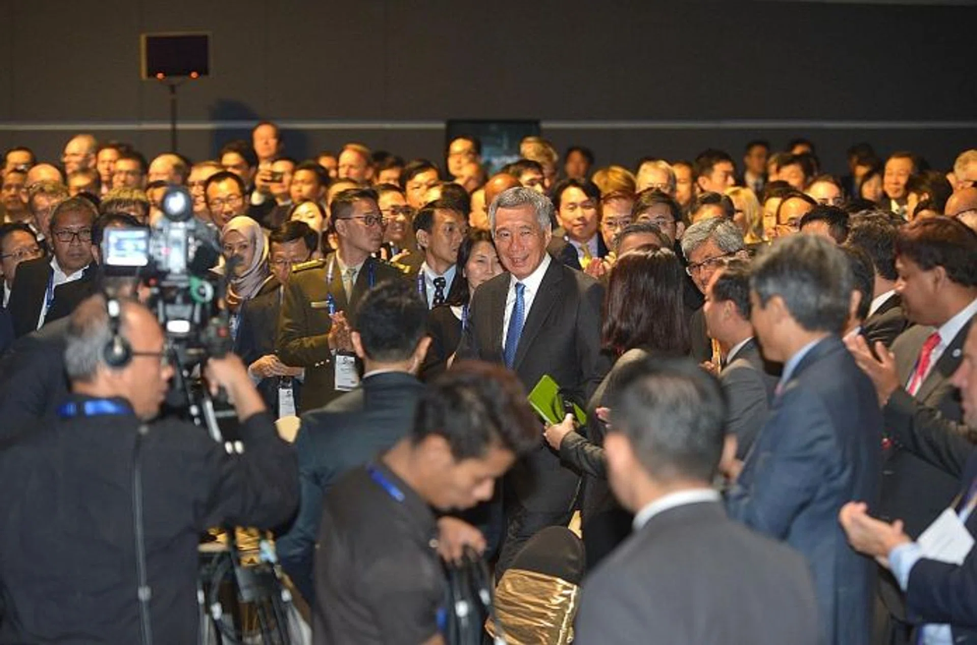 LAUNCH: (Above, centre) Prime Minister Lee Hsien Loong launched the National Cybersecurity Strategy yesterday at Suntec Convention Centre. 