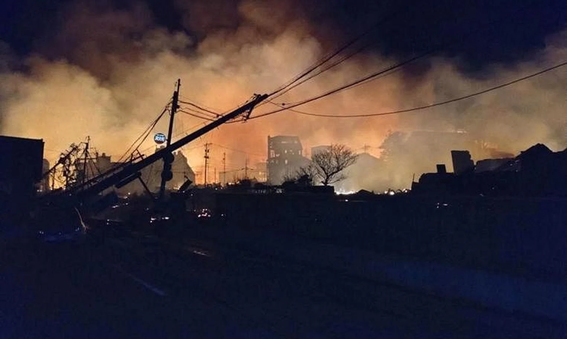 Fire burns following an earthquake at a residential area in Wajima, Ishikawa prefecture, on Jan 1.