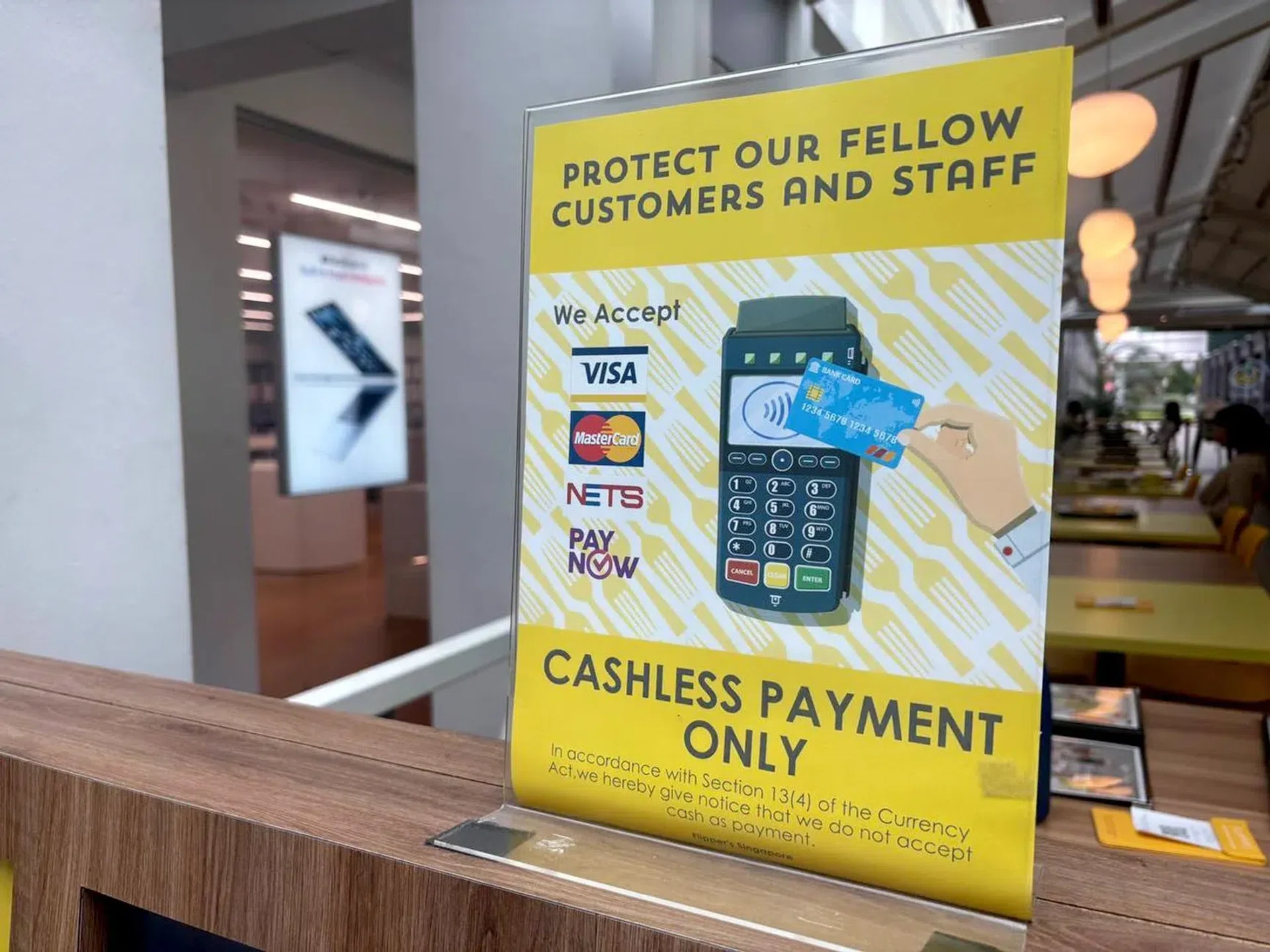 A sign at Flipper's cafe in Bugis Junction indicating that only cashless payment is accepted.