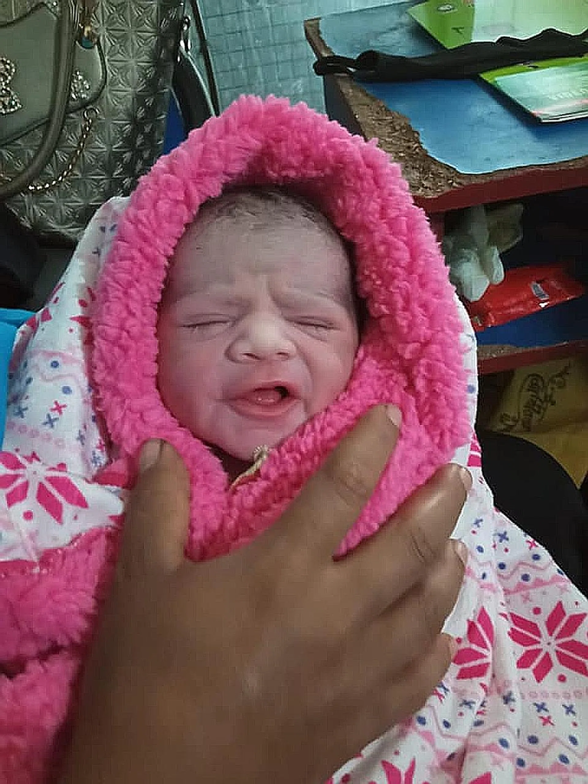 The baby boy of a 39-year-old construction worker infected with the coronavirus here.