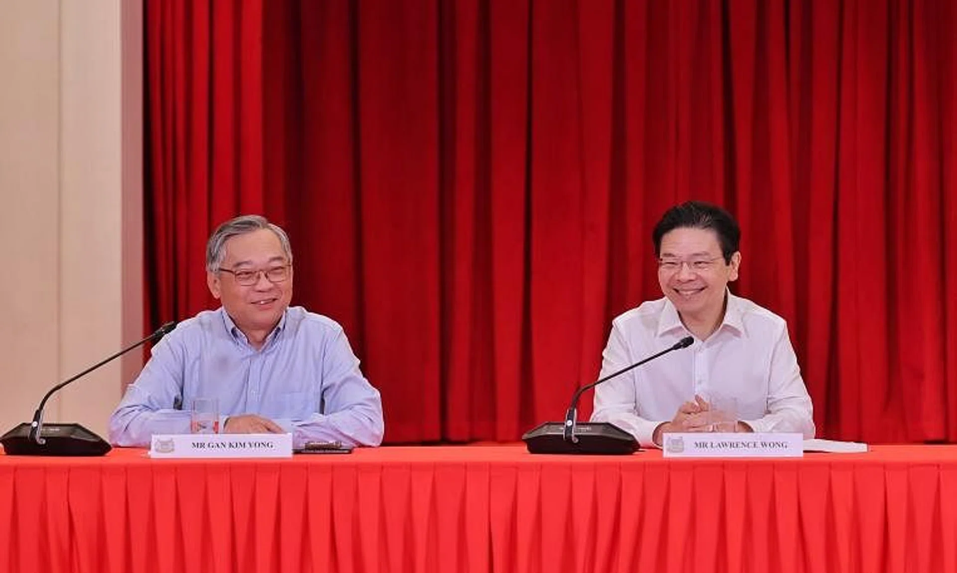 Minister for Trade and Industry Gan Kim Yong (left) and DPM Lawrence Wong at a press conference announcing the new Cabinet line-up on May 13.