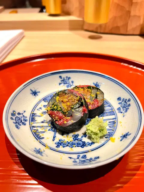 The sushi roll features the beef paired with hirame (flounder) for a surf and turf combo.