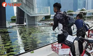 Youths fish openly at MBS, make away with catch of goldfishes