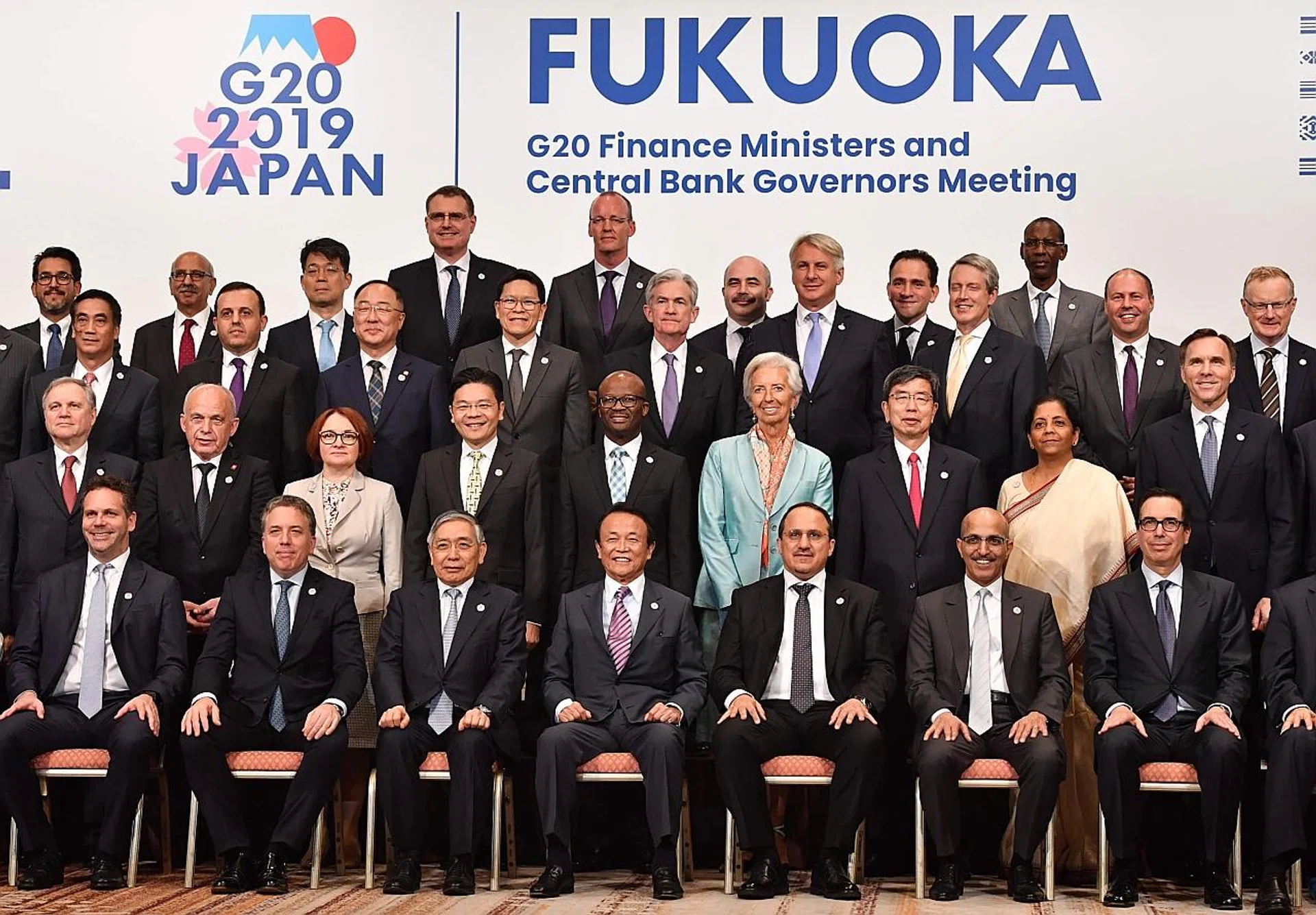 Japanese Finance Minister Taro Aso (front row, fourth from left) and Bank of Japan governor Haruhiko Kuroda (front row, third from left) with other delegation members at the G-20 finance ministers and central bank governors meeting in Fukuoka. 