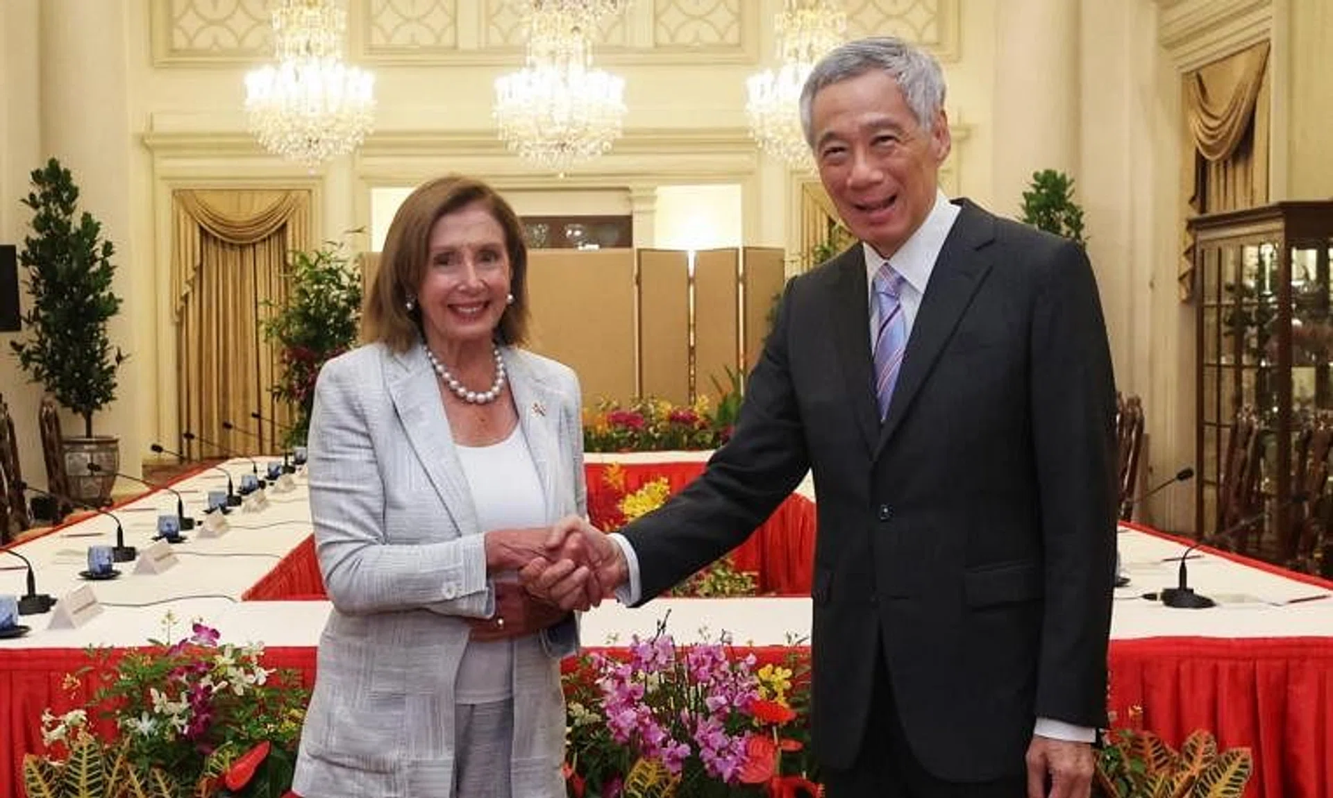 US Speaker of the House Nancy Pelosi and PM Lee Hsien Loong shake hands at the Istana, on Aug 1, 2022.