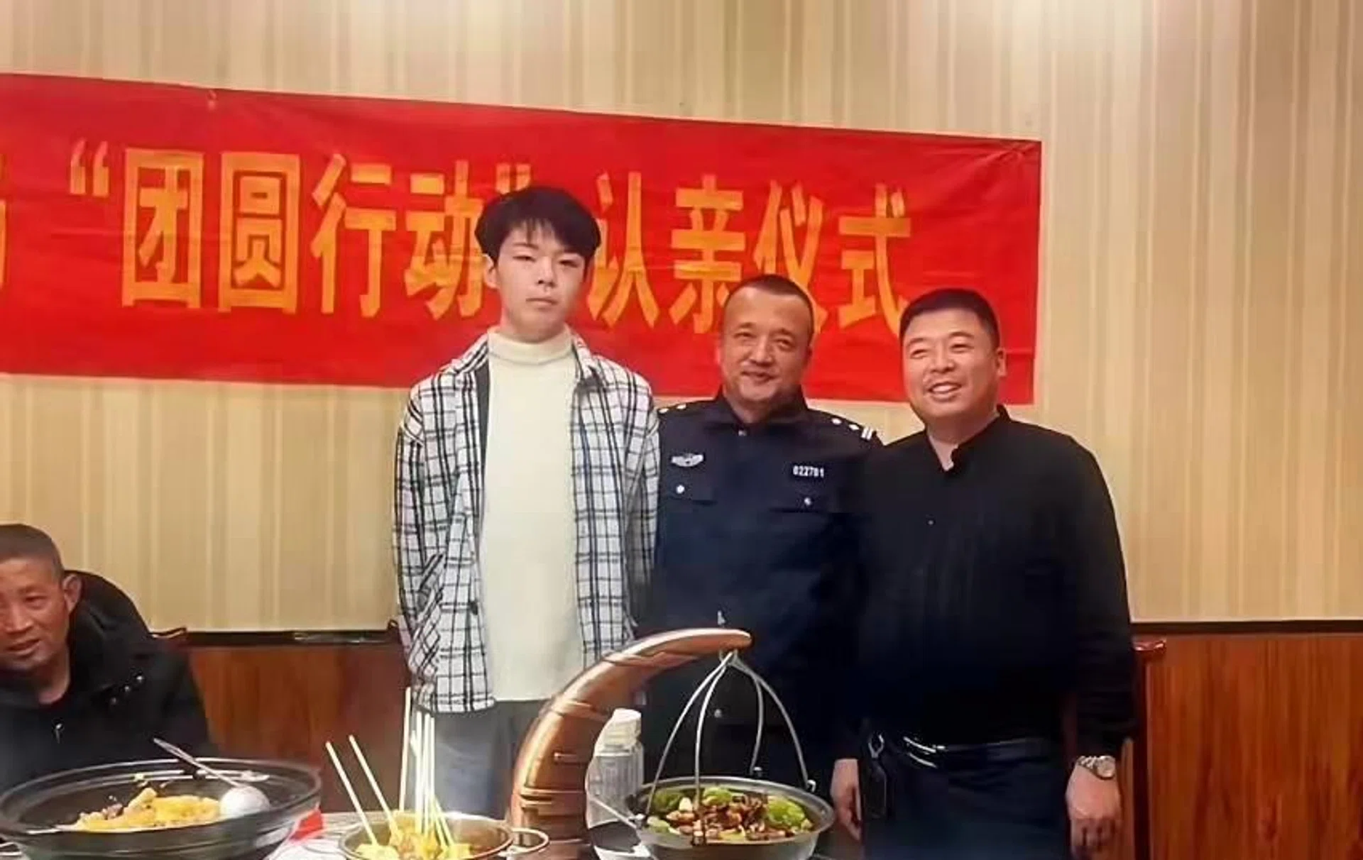 The happy reunion that was arranged by the Chinese authorities for Liu Xuezhou (left) and his father, Ding Shuangquan (right).