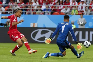 Denmark's Poulsen turns from villain to hero