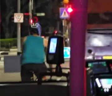 Slowpoke cyclist holds up bus, sparks online fury