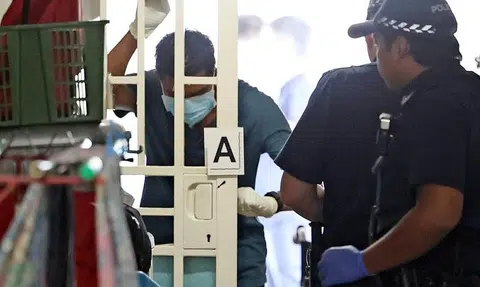 Man found unconscious in Henderson Road flat with his wife's body dies in hospital