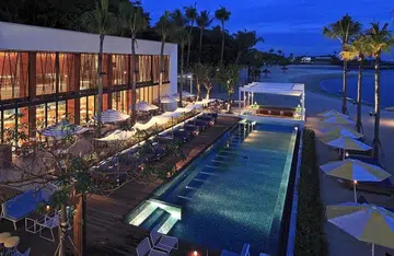 Woman jailed for slapping, spitting at cops after swimming topless