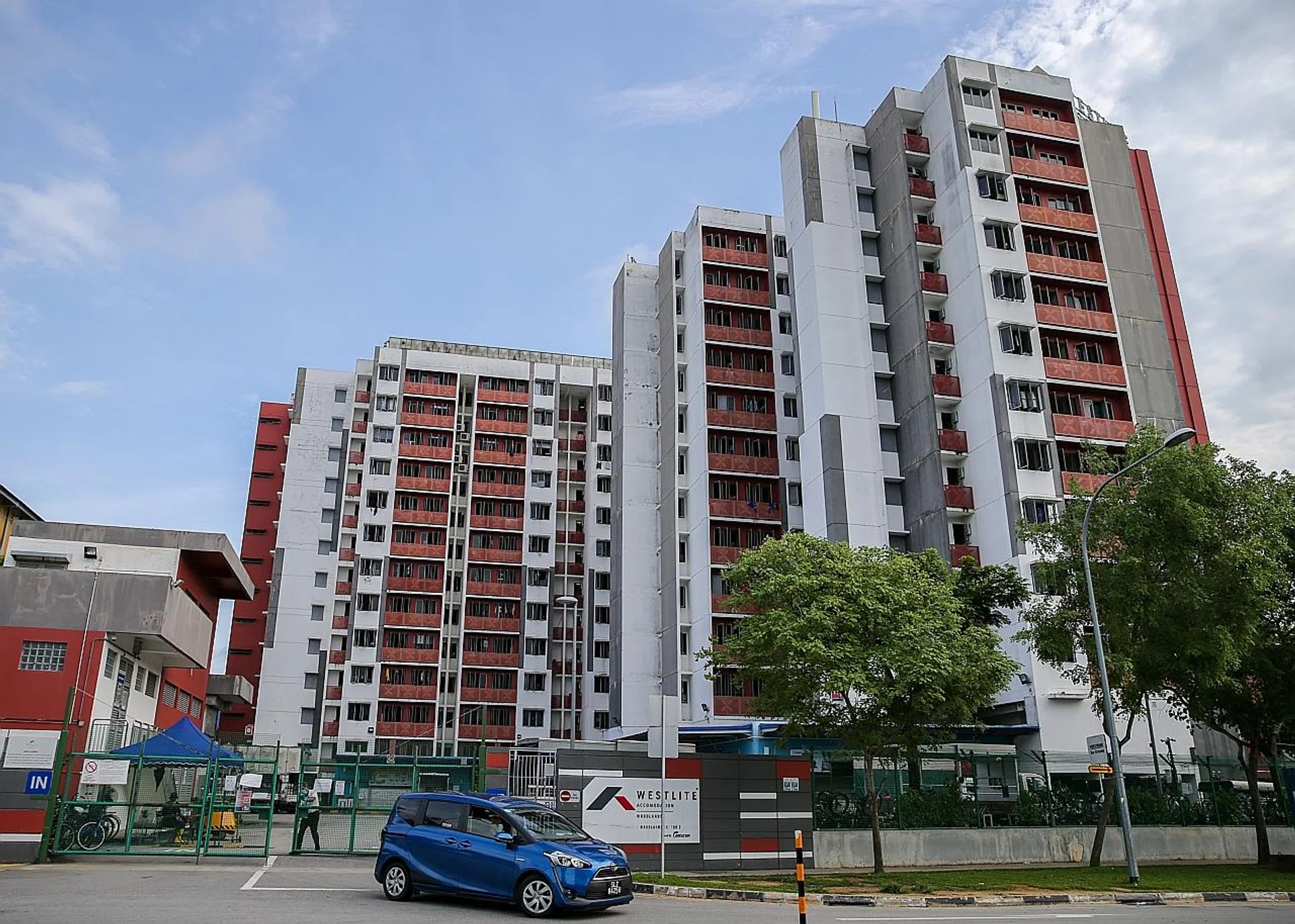 The cluster at Westlite Woodlands dormitory has seven cases so far, including five workers who were reinfected.